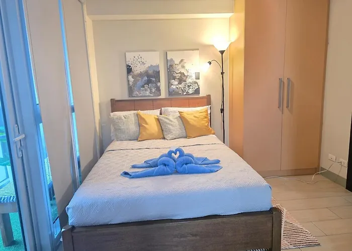 Apartamento Urban Oasis At Bgc Uptown Parksuites With Balcony 300mbps Close To Uptown Mall Grand Hyatt Mitsukoshi And St Lukes Manila